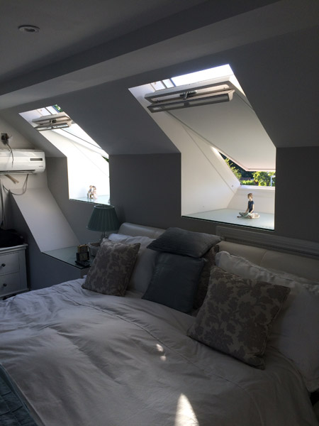 Loft conversion bedroom with velux windows in Littlehampton, Sussex